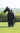 EQUIDRY women's thin fleece long waterproof horse riding coat in black/black with horse