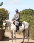 EQUIDRY waterproof horse riding raincoat All Rounder Original thick fleece Women's Charcoal/Grey rider on horse