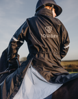 Evolution Children's | Thin Fleece | Stowaway Hood | Reflective | Black Forest Green - EQUIDRY waterproof riding coat on horse
