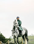 EQUIDRY Black Forest Green Equimac Long waterproof coat  lightweight  raincoat worn by woman horse riding