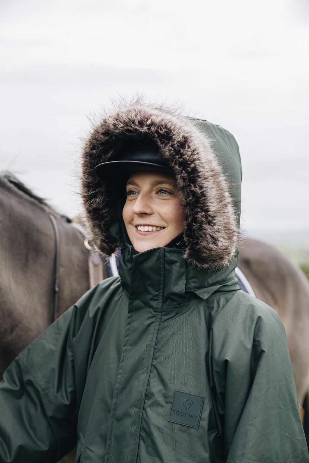 EQUIDRY |  Parka | Women&#39;s | Black Forest Green -  waterproof riding and leisure coat with padded inner detachable faux fur trim rider with hood over hat