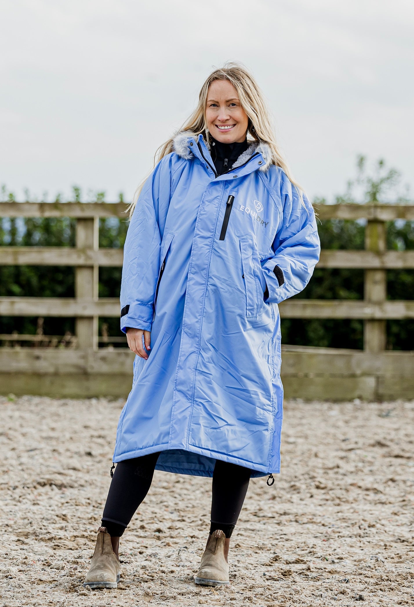 EQUIDRY Evolution Lux Women's Warm Waterproof Winter Horse Riding Coat Thick Fleece Lining with Faux Fur Trim Hood sky nelly blue hood down front view