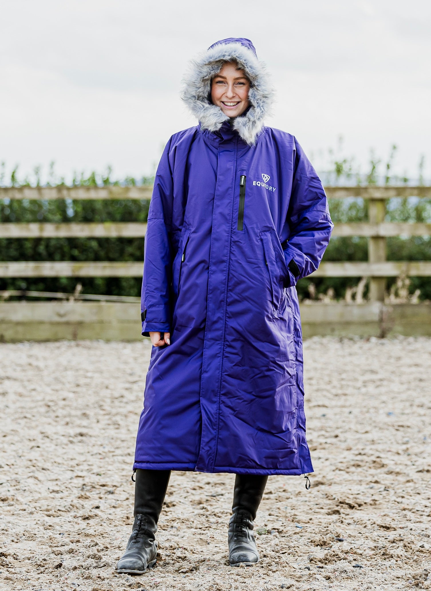 EQUIDRY Evolution Lux Women's Warm Waterproof Winter Horse Riding Coat Thick Fleece Lining with Faux Fur Trim Hood purple rider in arena hood up