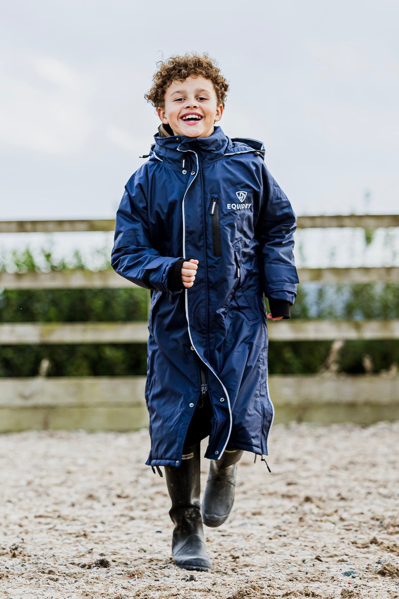 EQUIDRY waterproof horse riding raincoat thin fleece pro ride reflective in navy children's running in arena