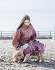 EQUIDRY chestnut Equimac long waterproof lightweight rain coat worn by dog walker pictured with dog 