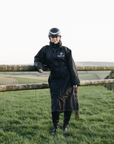 EQUIDRY Black Equimac Long waterproof riding coat  lightweight  raincoat worn by young horse rider