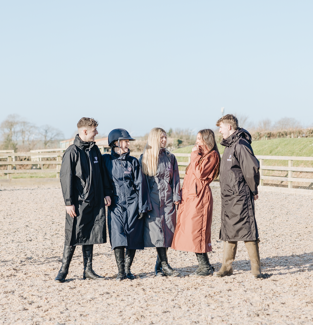 EQUIDRY equimacs chestnut brown navy charcoal and black long waterproof lightweight rain mac worn by men and women keeping dry 