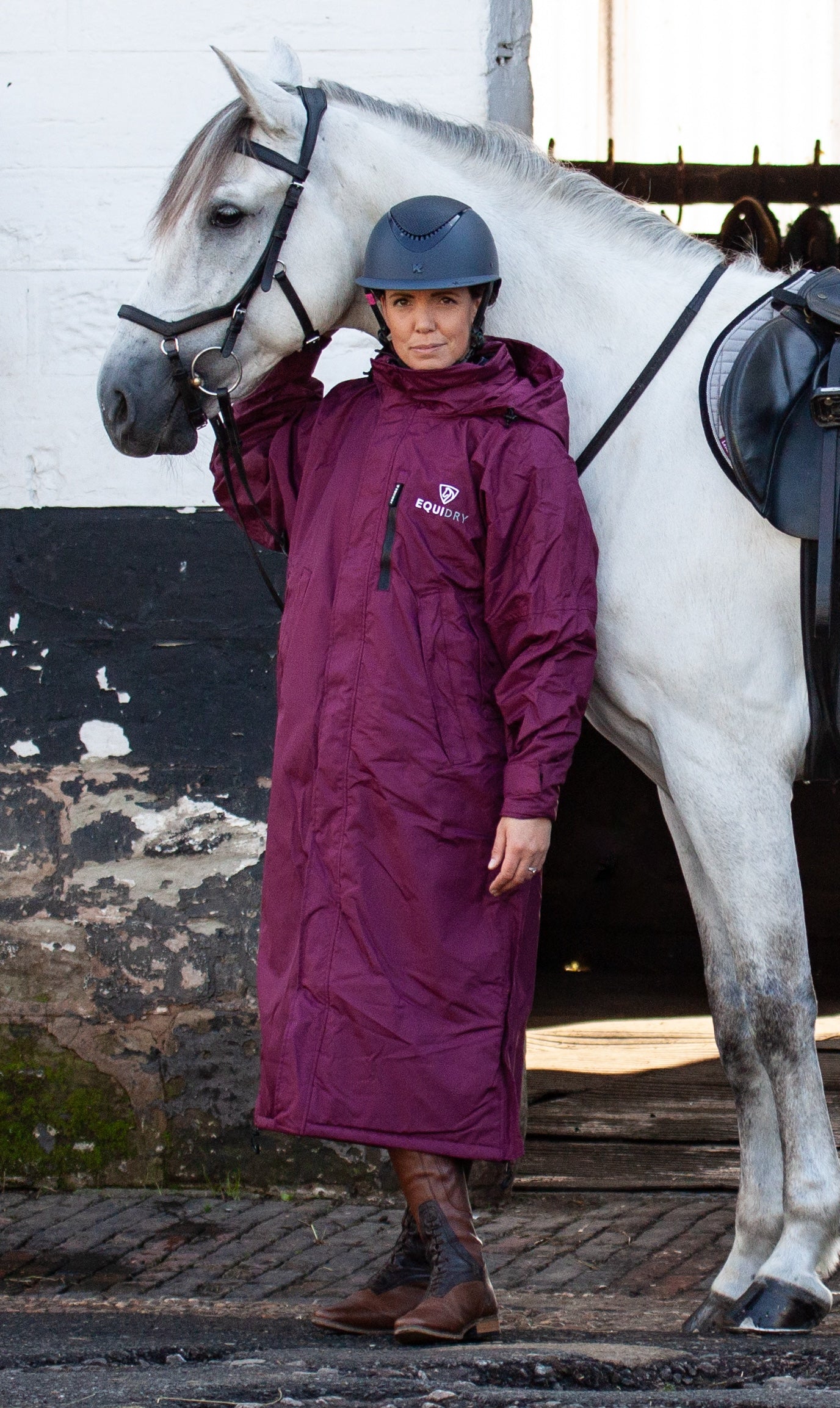 EQUIDRY women's thin fleece stowaway hood long waterproof horse riding coat in plum with horse