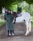 equidry black forest green waterproof riding and leisure coat with padded inner detachable faux fur trim rider with horse