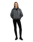 EQUIDRY women's waterproof short blouson style horse riding jacket in charcoal/penelope pink studio shot front view 