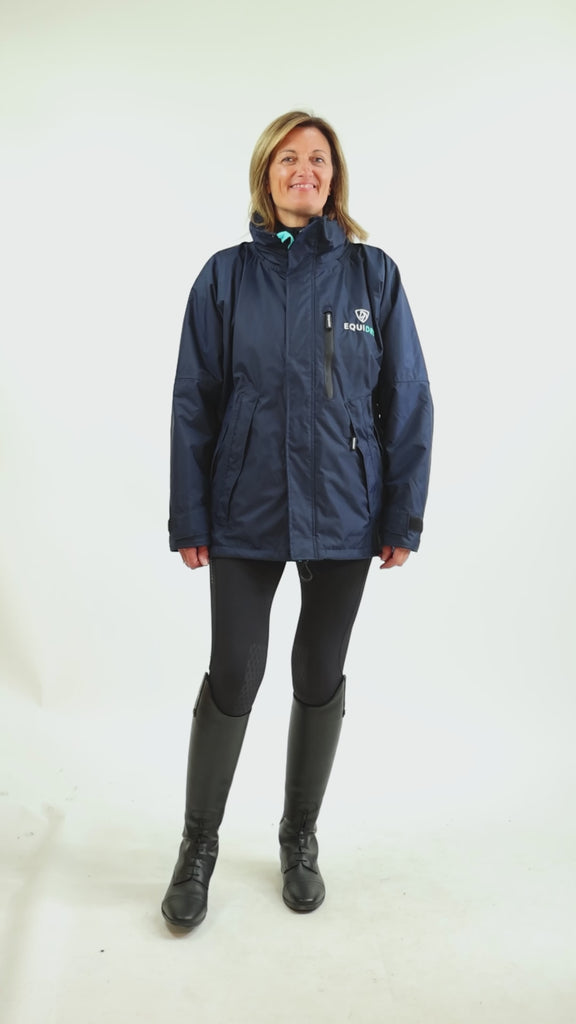 EQUIDRY women's waterproof short blouson style horse riding jacket in navy/turquoise studio video